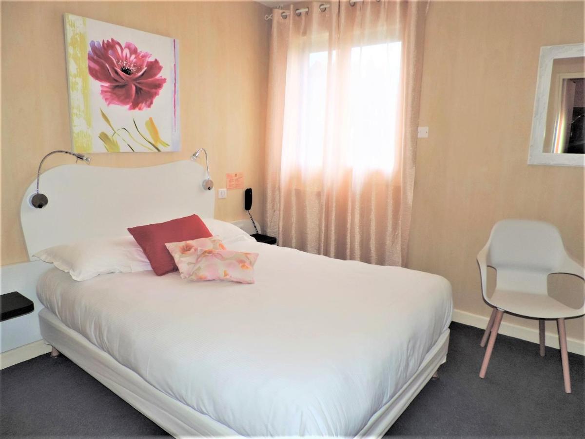 Auv'Hotel Mauriac  Bagian luar foto